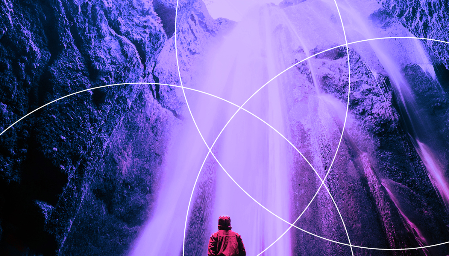 A person in a red jacket facing a massive, purple-tinted waterfall with geometric white lines overlaying the image.